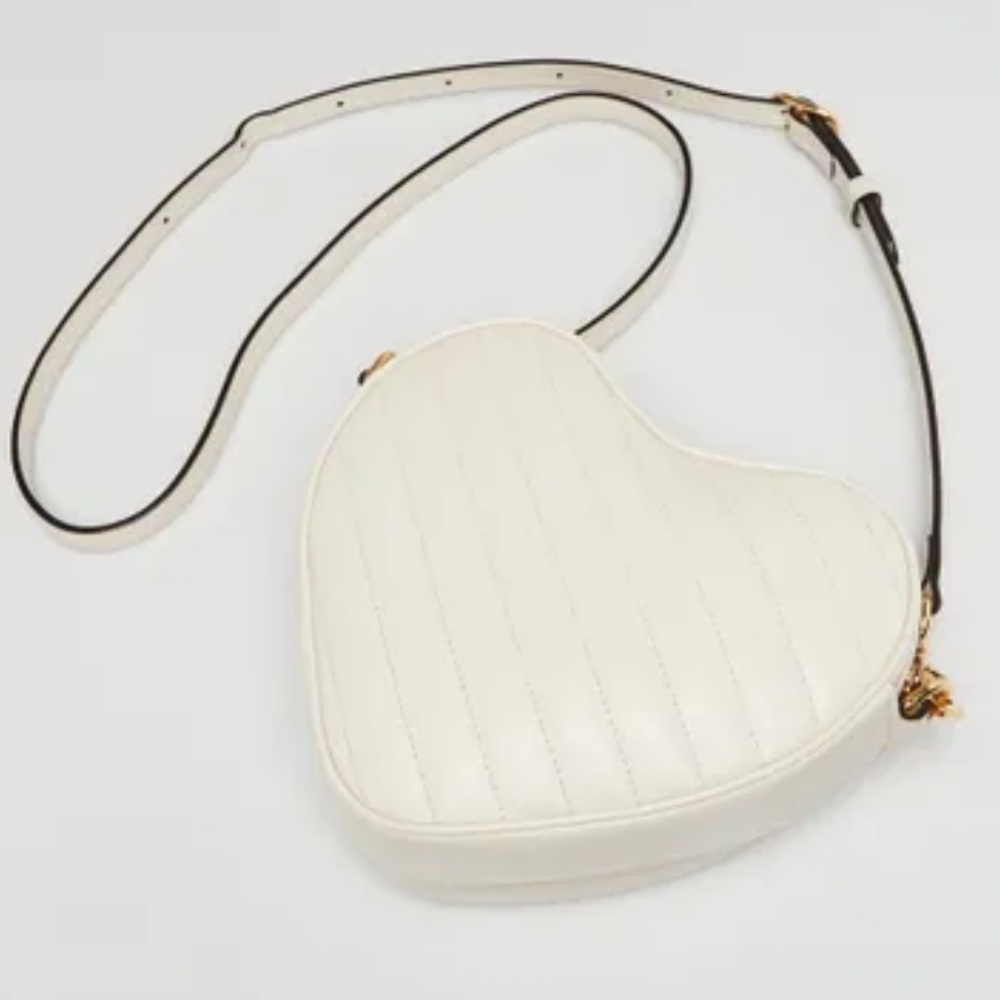 New! GUCCI
White Quilted Leather
Interlocking G Mini Heart
Crossbody Bag - Picture 10 of 12